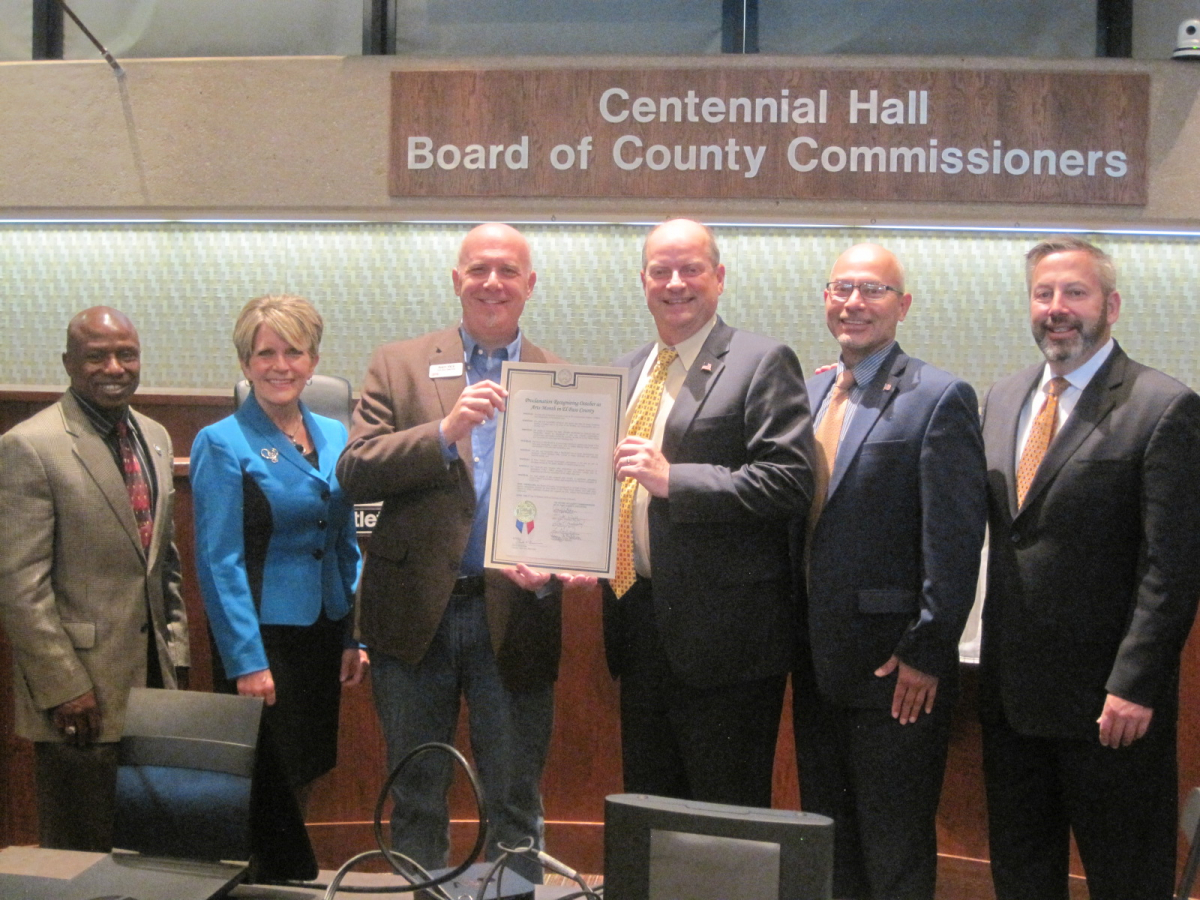 Andy Vick (center left), Executive Director of the Cultural Office of the Pikes Peak Region, with the Board of El Paso County Commissioners, who unanimously approved a Proclamation recognizing October as Arts Month. Photo courtesy of the Cultural Office.